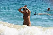 nude girls posing on the beach