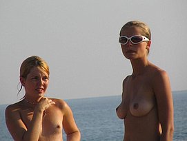 nude girls posing on the beach
