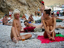 nude girls on beach showing shaved pussies