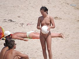 nudism pissing in the beach pic